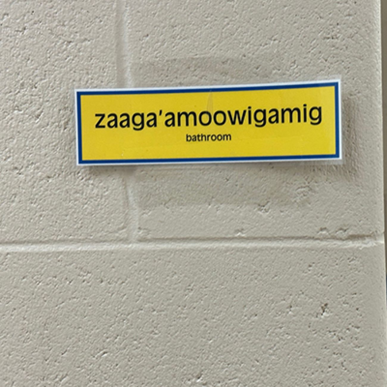 a sign that says zaaga'amoowigamig, which means bathroom