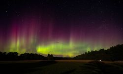 Northern Lights, Summer Nights - Upper Peninsula Of Michigan. The lights have hues of purple and green