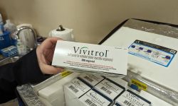 someone holding a box of Vivitrol