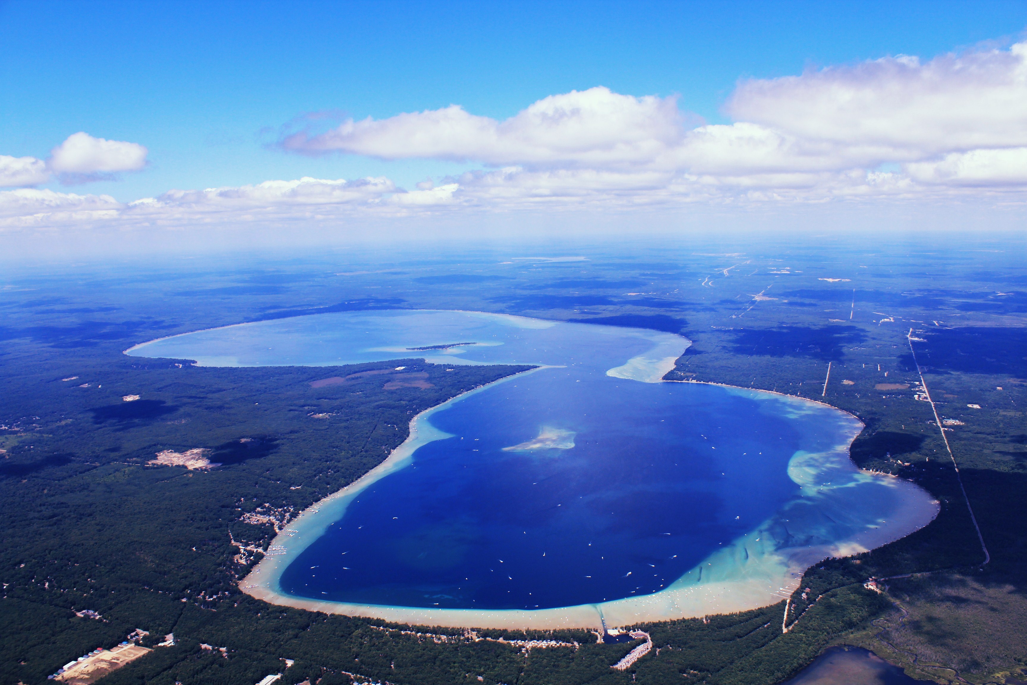 Higgins Lake’s crystal waters are under threat. Blame poop (and other