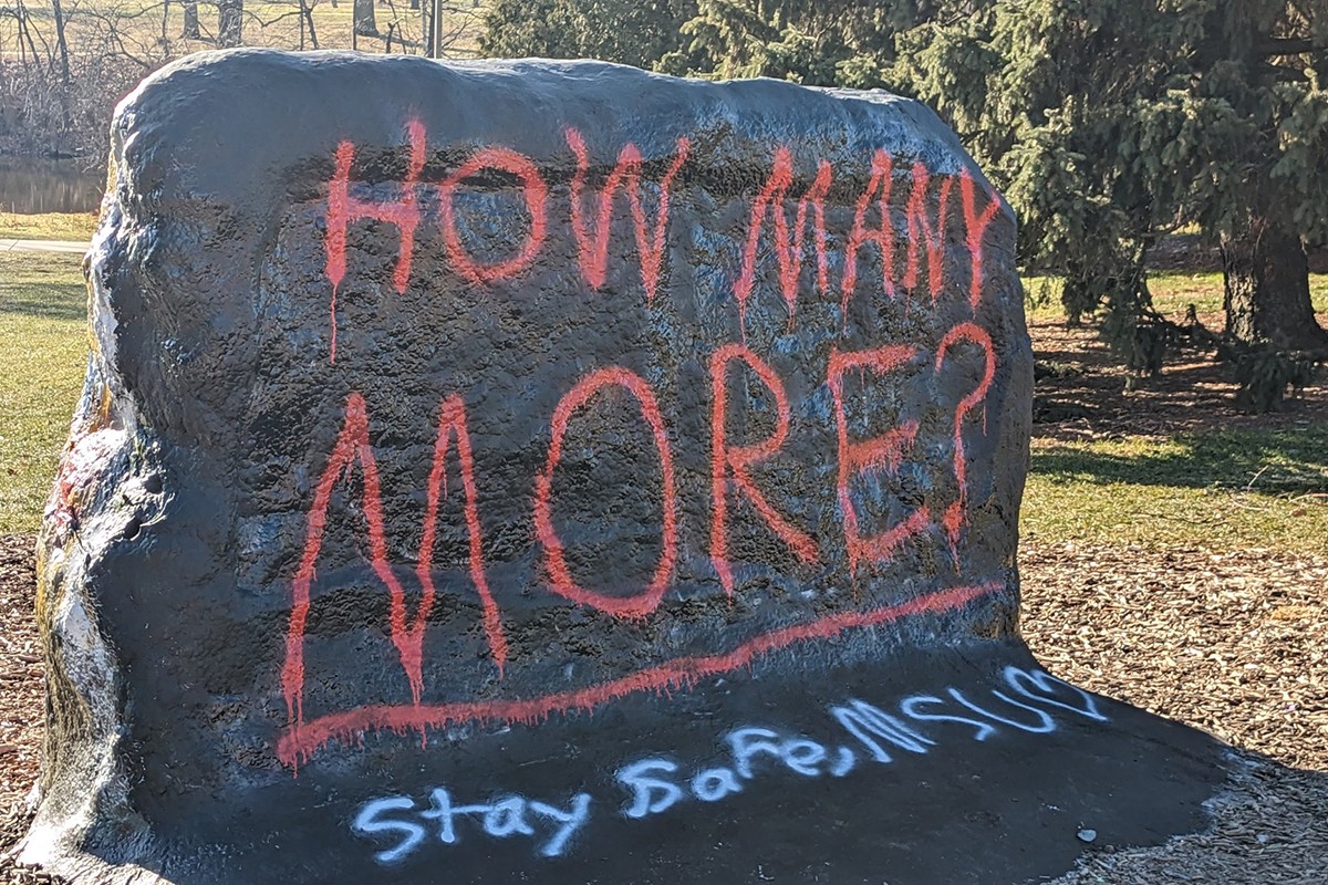 MSU rock painted to say "how many more"