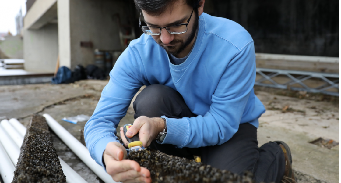 Man with zebra mussels Man with zebra mussels