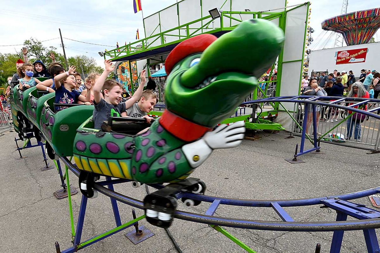Mostly-unmasked children enjoyed the crocodile coaster at the Durand Railroad Days Festival.