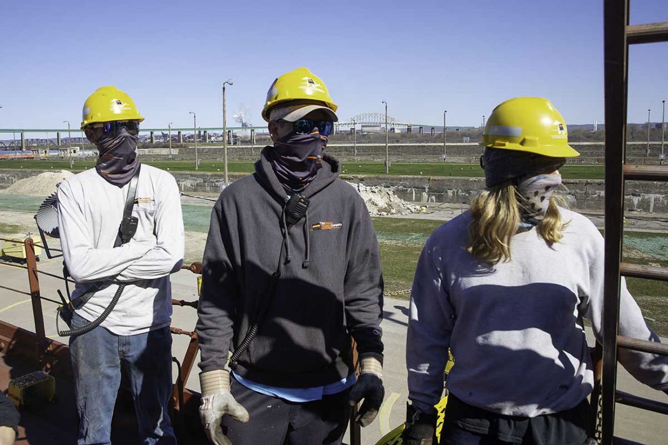 Freighter Lee Tregurtha crew members Scott Matis, 42, Isaac Drost, 24 and Gregory Myers, 26, awaiting public health workers for COVID vaccinations