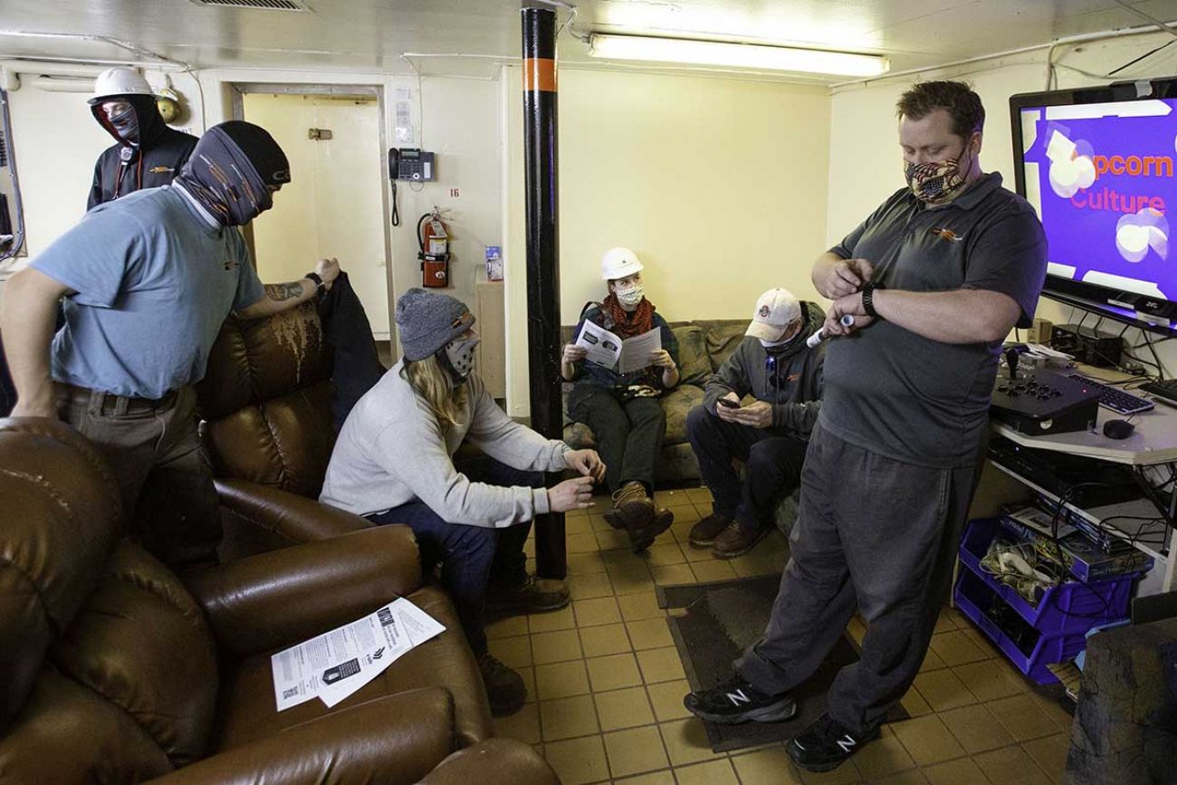 Lee Tregurtha crew members waiting for clearance after receiving COVID vaccinations by public health team