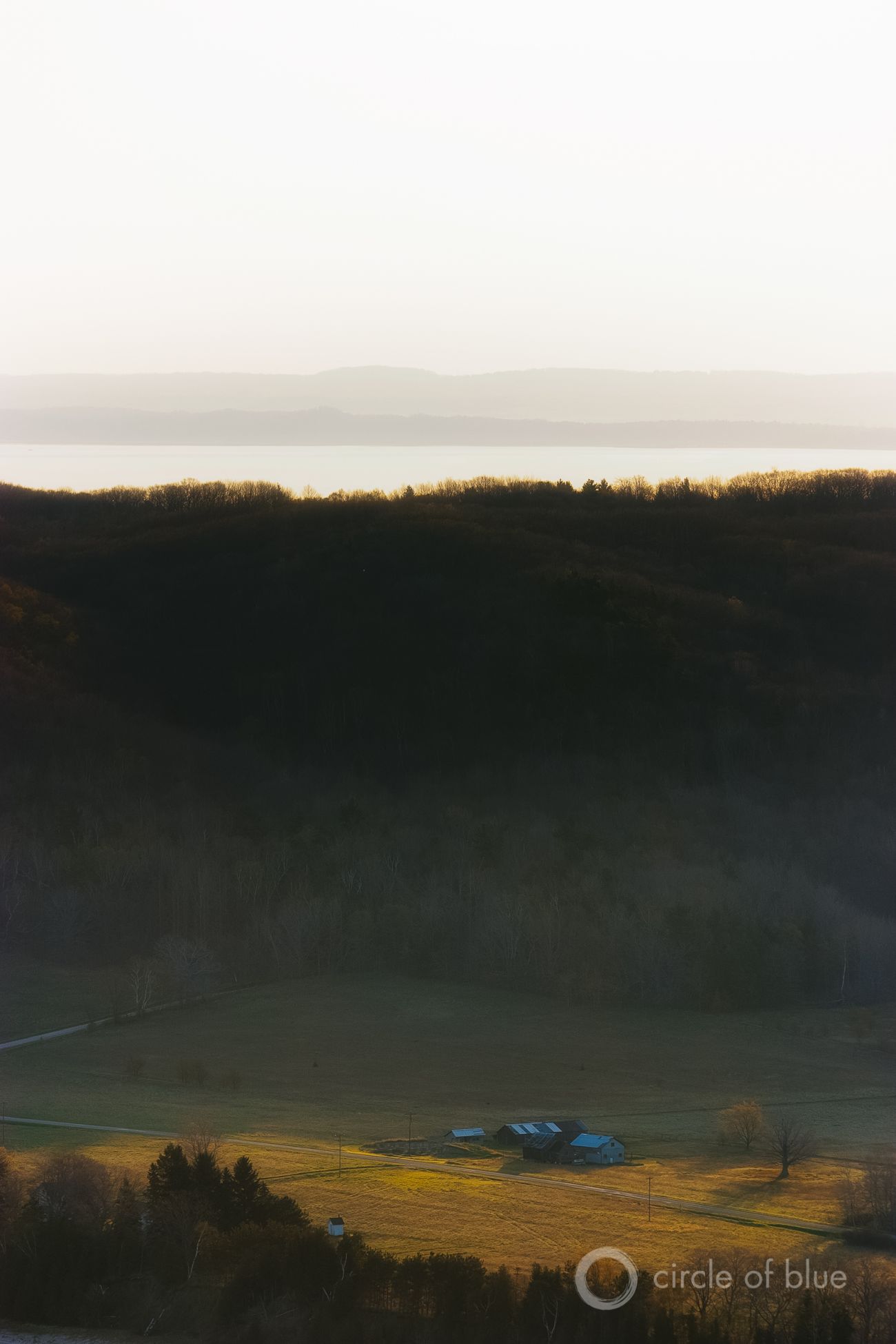 A farm set back from the eroding shoreline of Lake Michigan