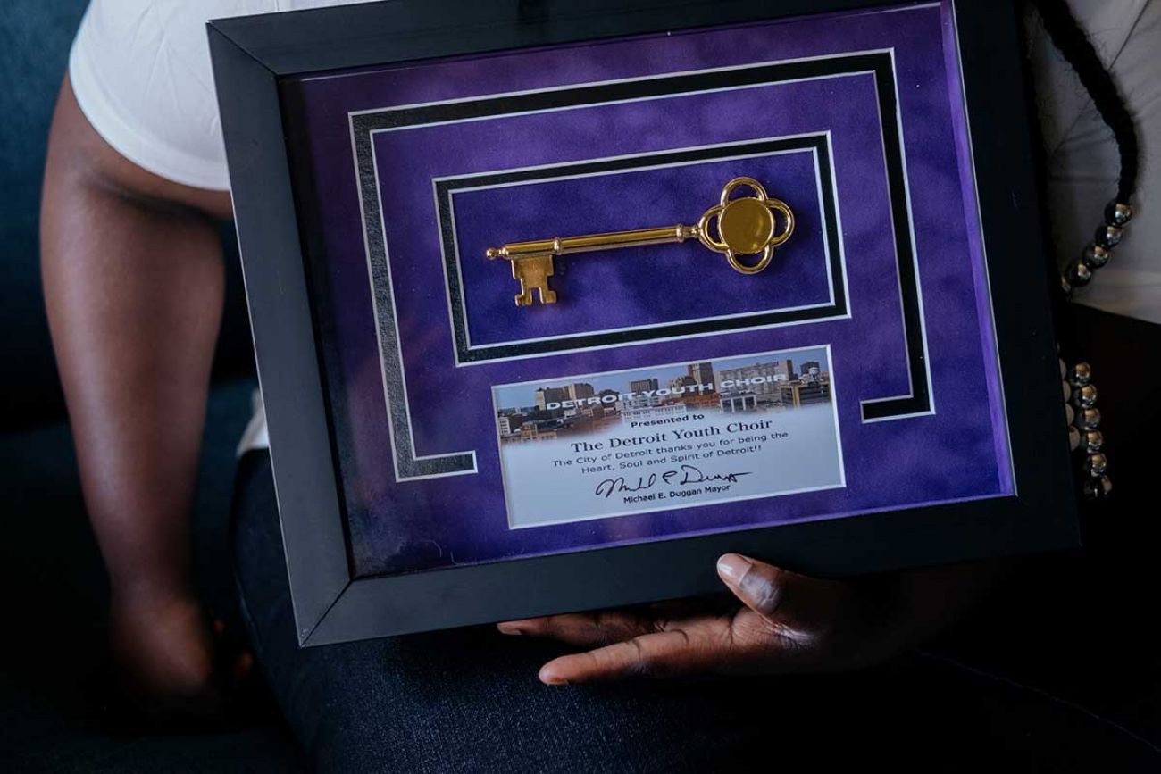 Symone, 17, shows her key to the city of Detroit received as a member of the Detroit Youth Choir, known for appearing on America’s Got Talent