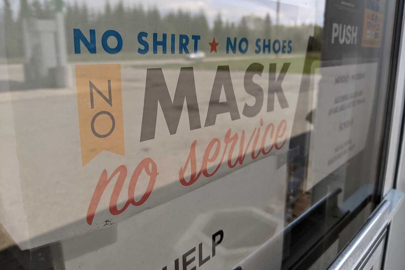 sign saying mask required for service 