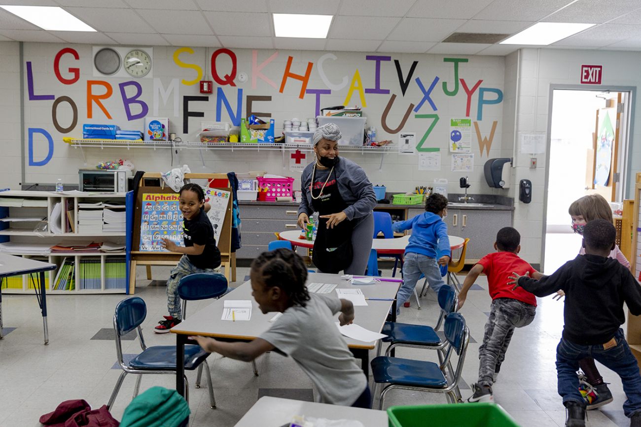 children and a teacher