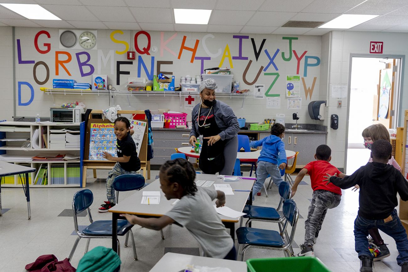 children and a teacher 