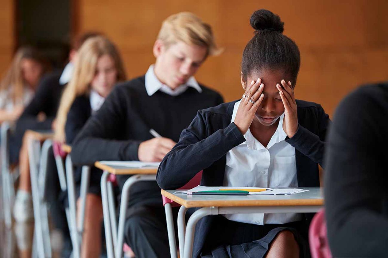 classroom with stressed student