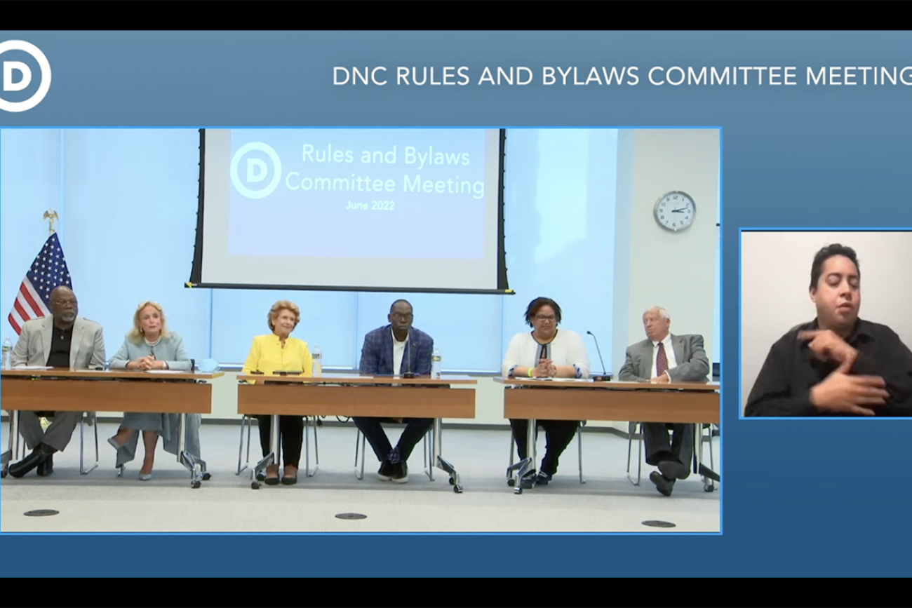Debbie Stabenow, Debbie Dingell Garlan Gilchrist and Lavora Barnes on a table 