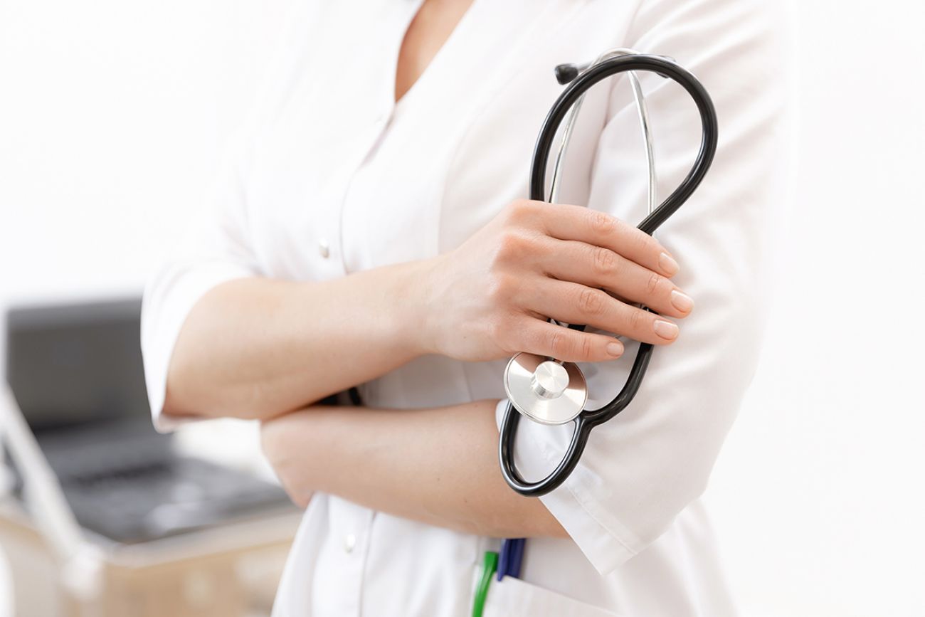 woman doctor hands hold phonendoscope.