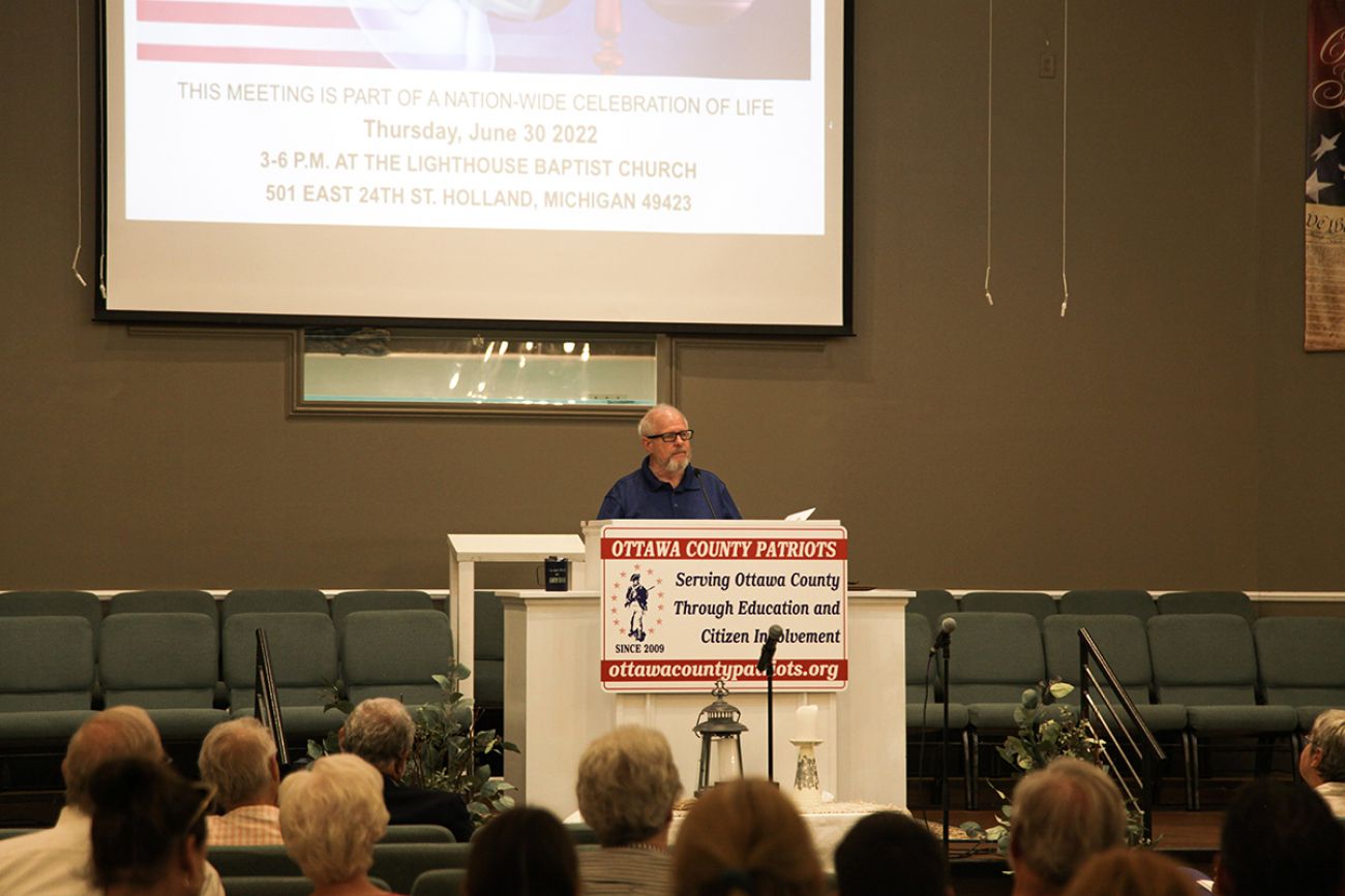 man speaking to a group