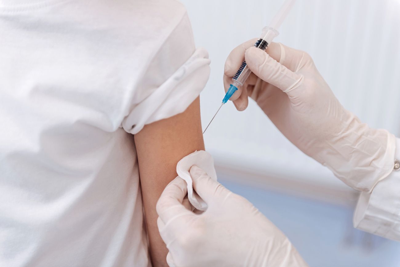 kid getting vaccine