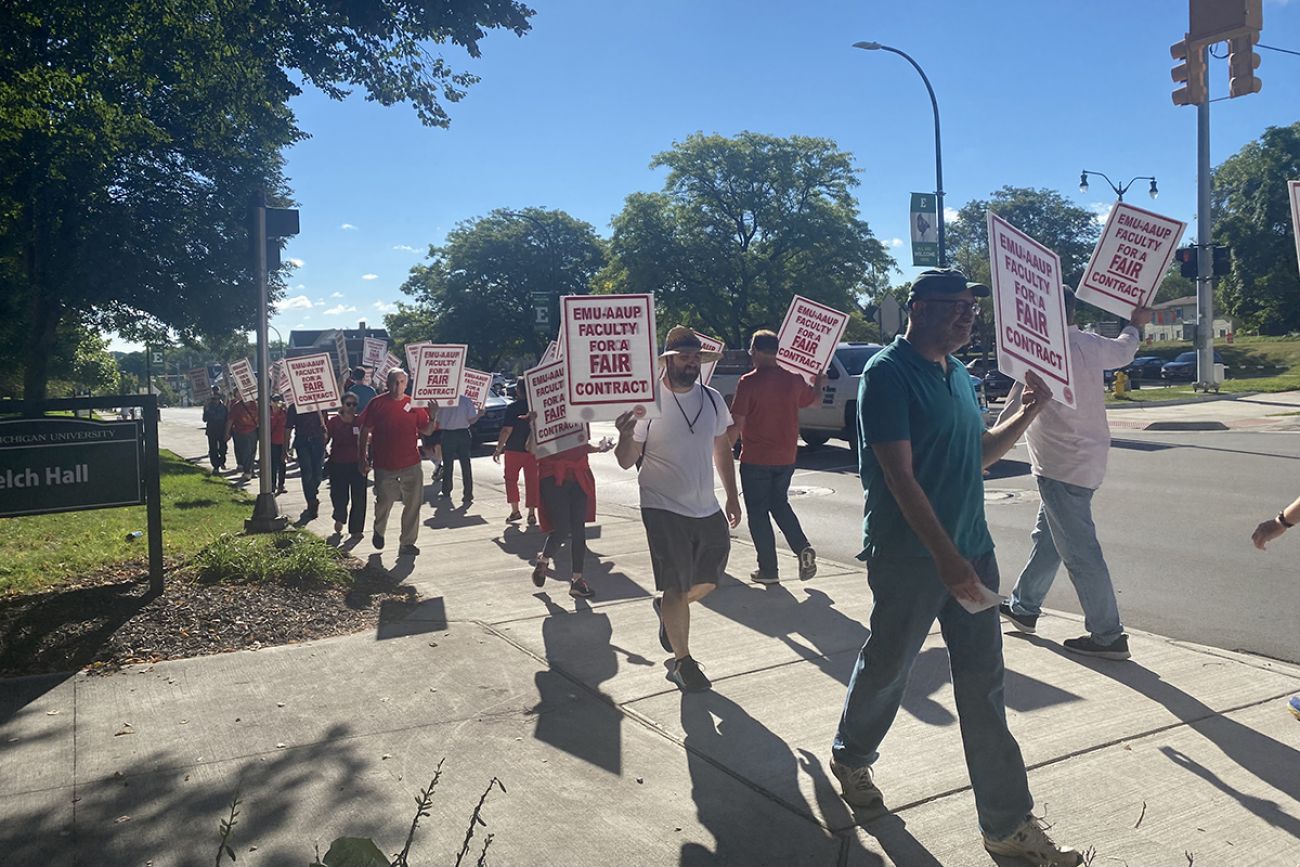 people marching on EMU's campus