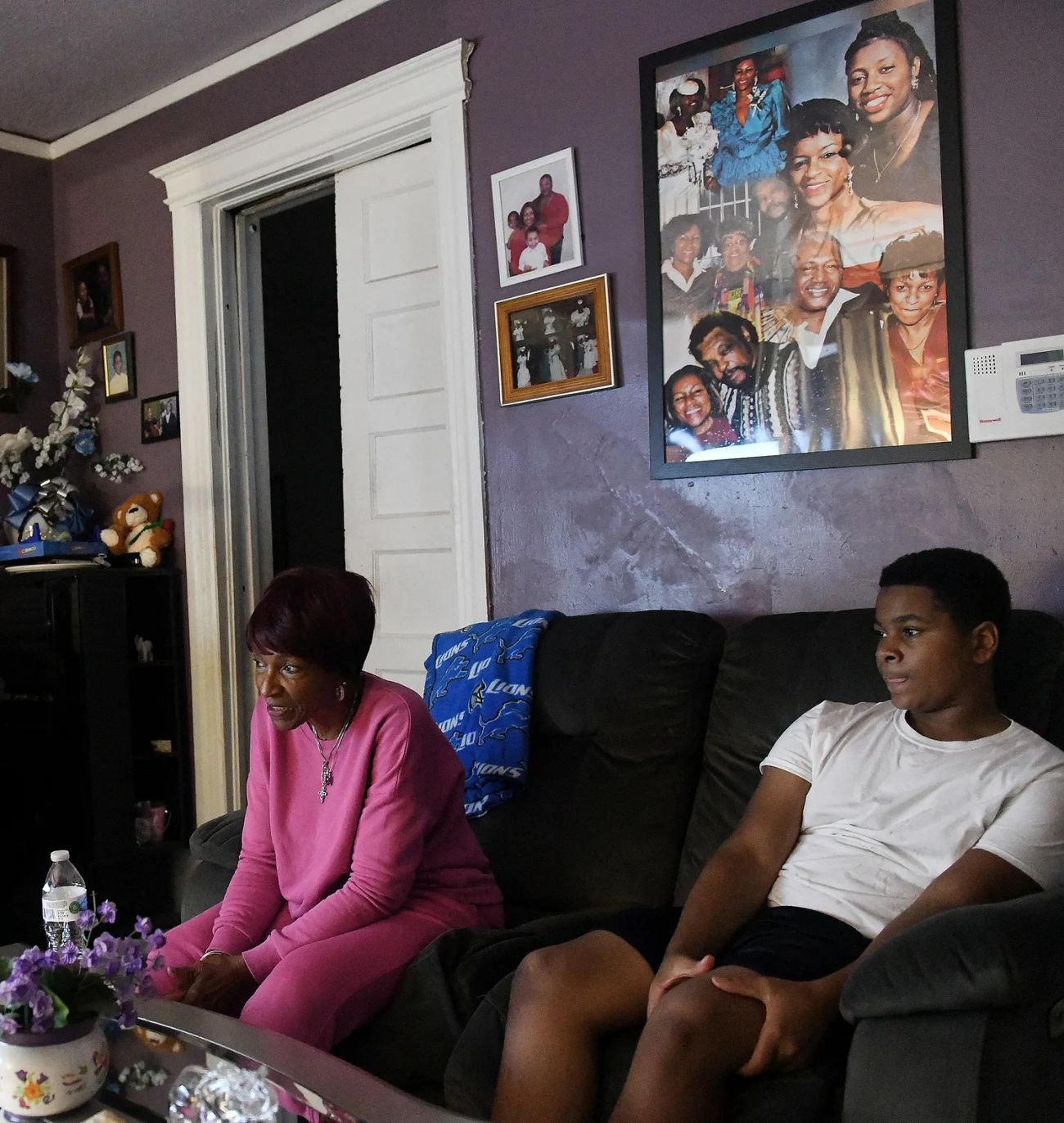 two people sitting on a couch