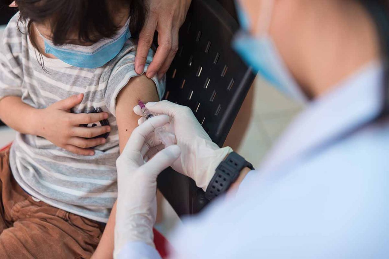 child receiving vaccine