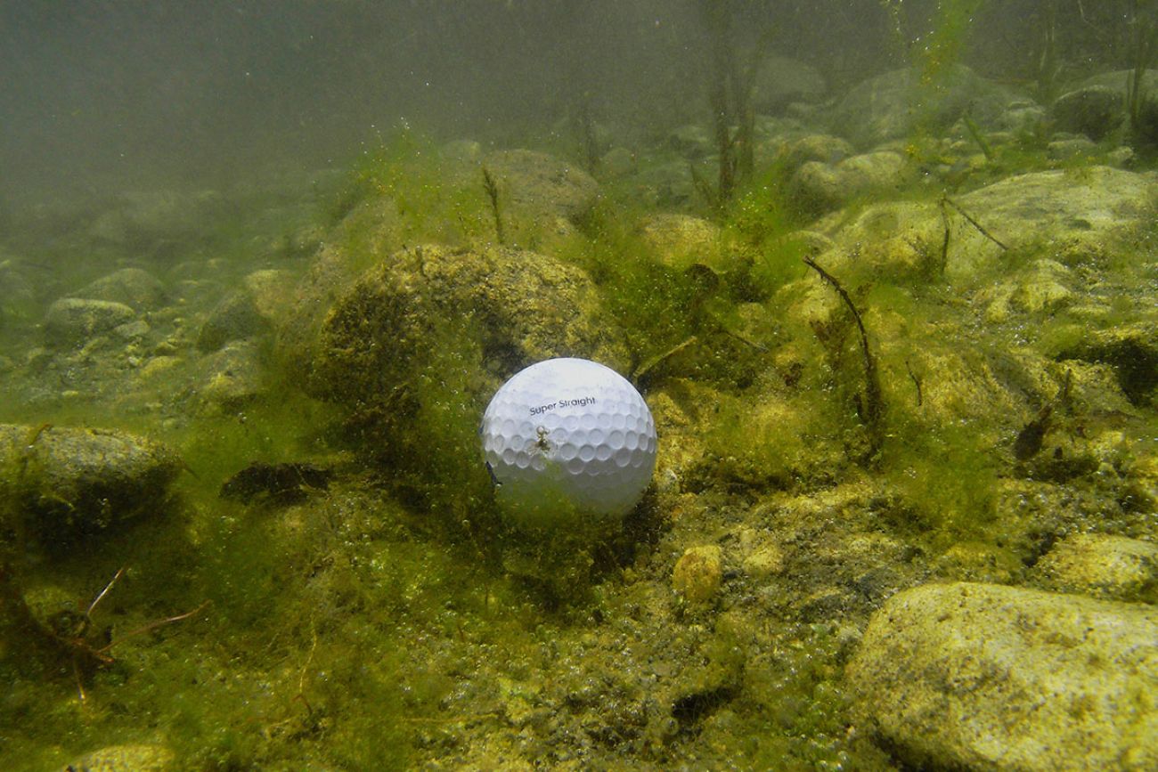 golf ball in the bottom of a river