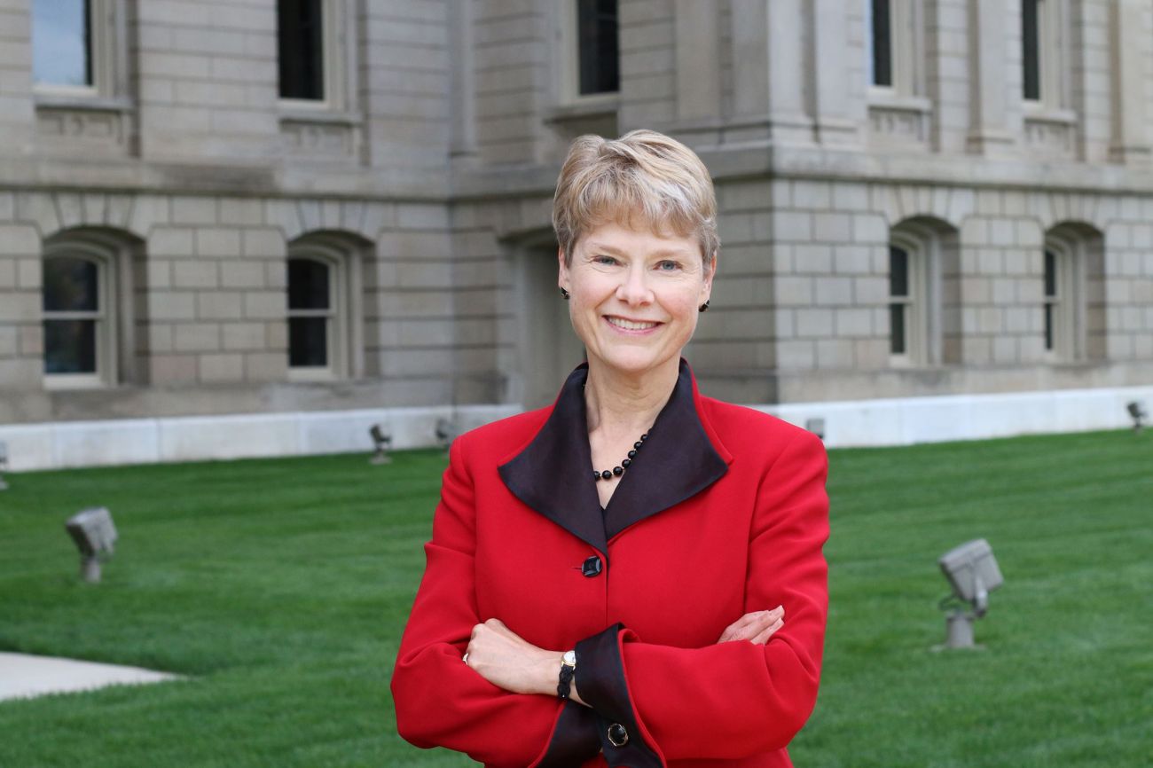 Carol Siemon standing outside