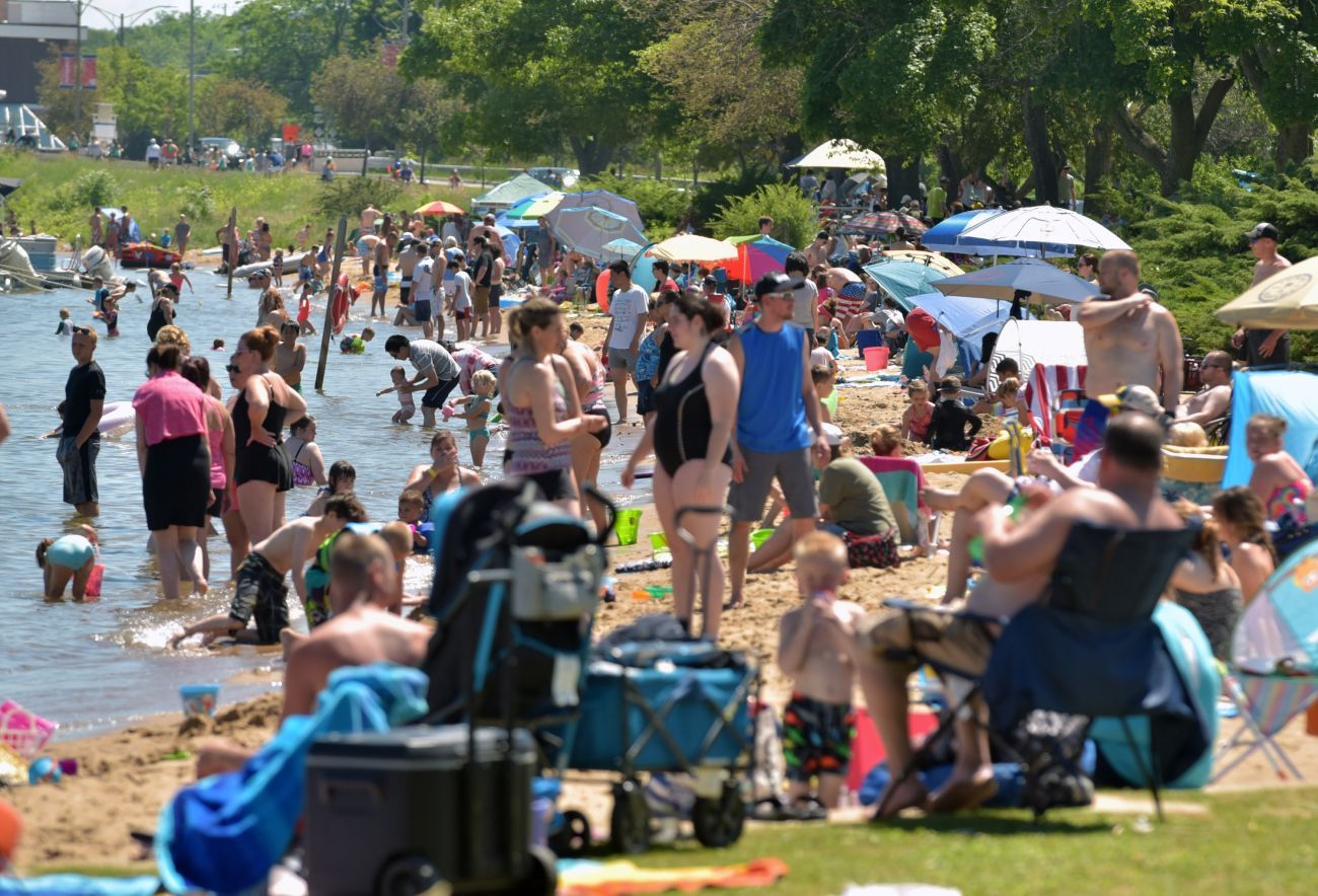 a bunch of people on the beach