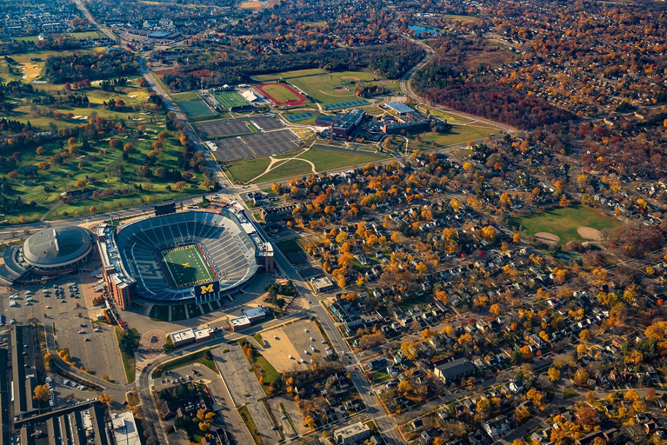 Aerial view of Michigan Stadium, Crisler Arena, Pioneer High School, and much of the west side of Ann Arbor