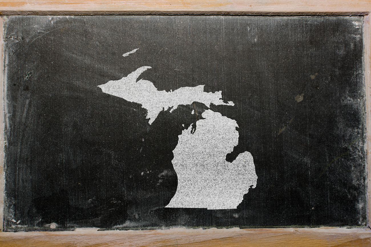 drawing of the state of michigan on chalkboard, drawn by chalk