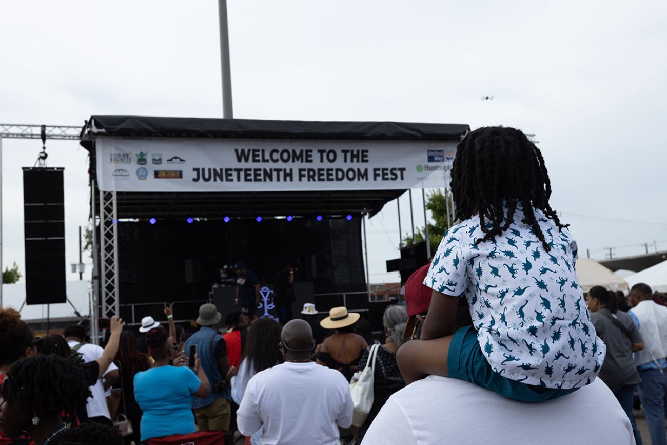people celebrate Juneteenth in an event organized in Detroit