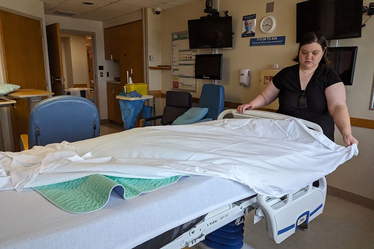 woman cleaning hospital room
