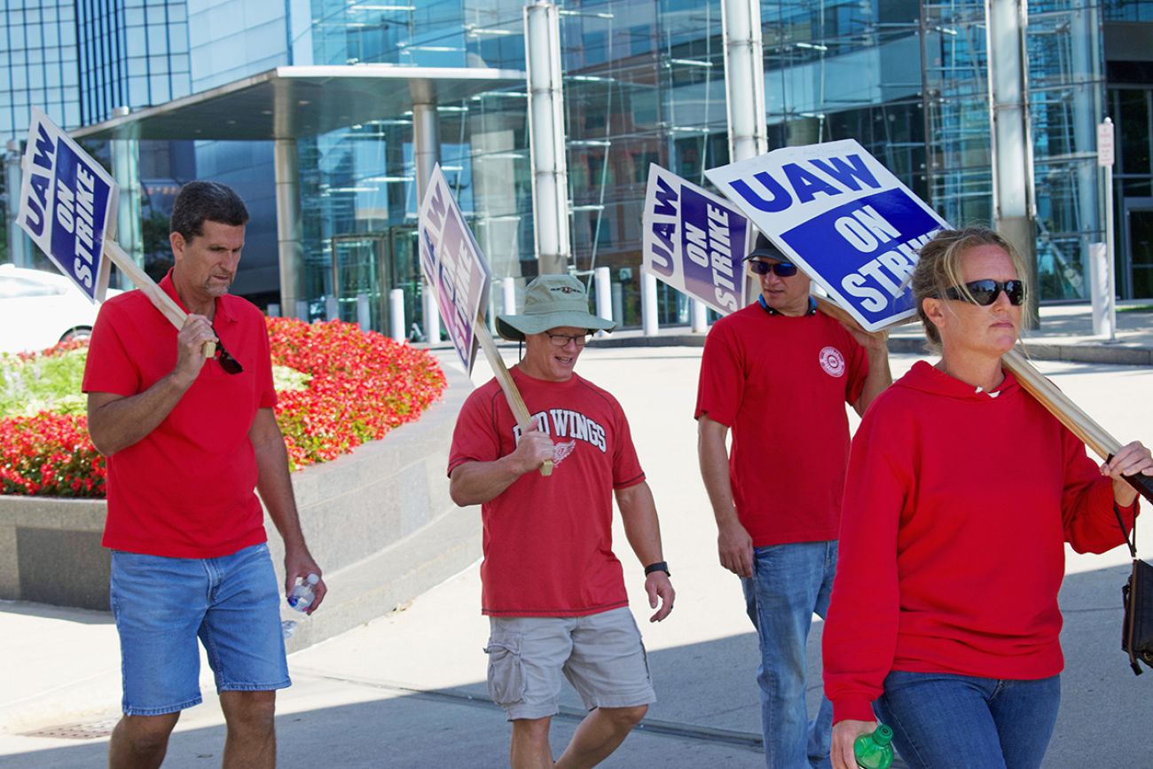 UAW Strikers with signs in front of General Motors Headquarter in 2019