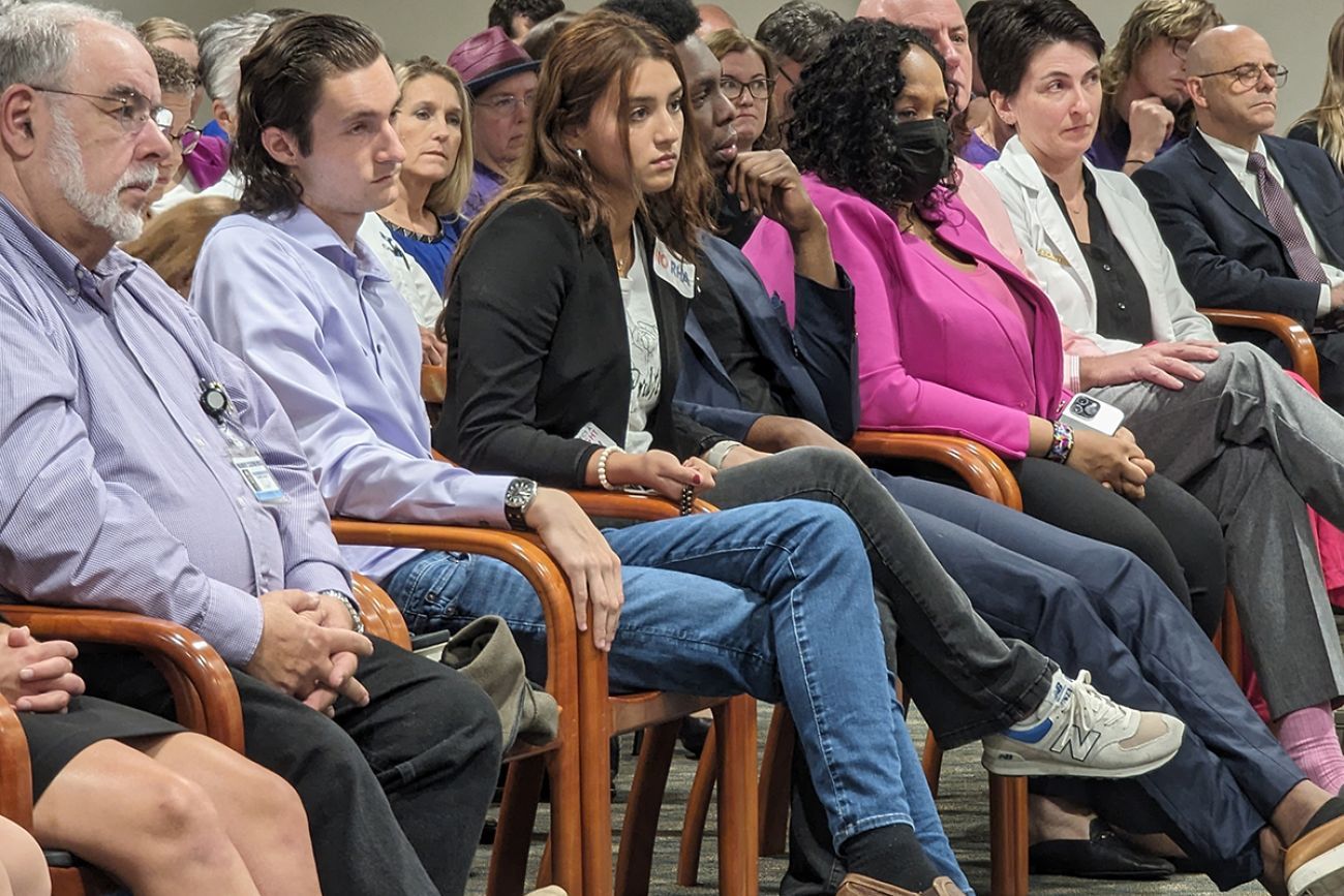 people sitting in chairs