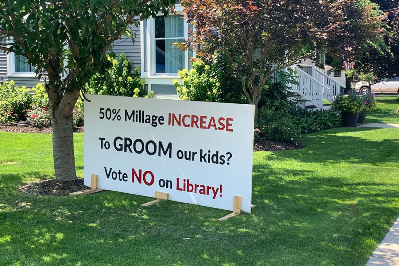 sign against library millage 