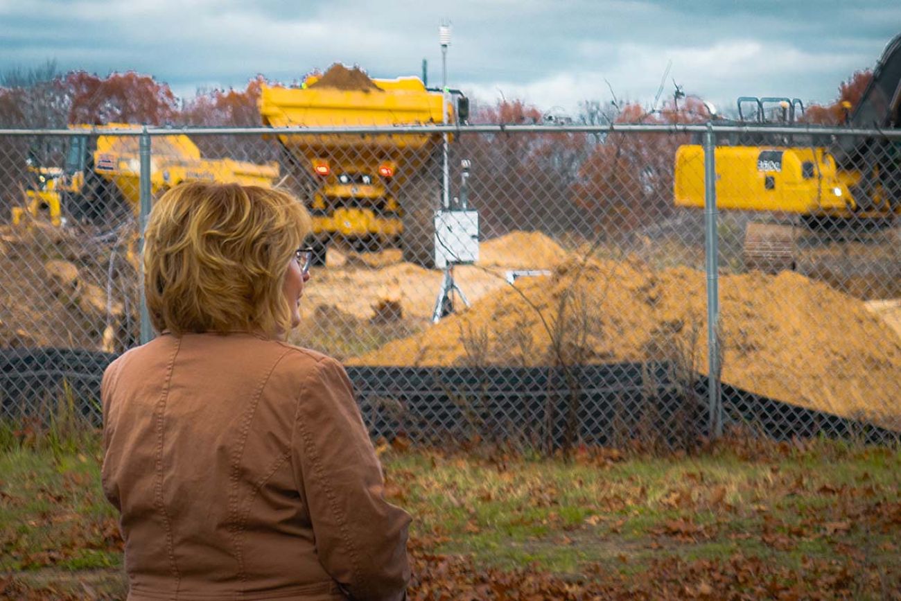 Sandy Wynn-Stelt looking at site