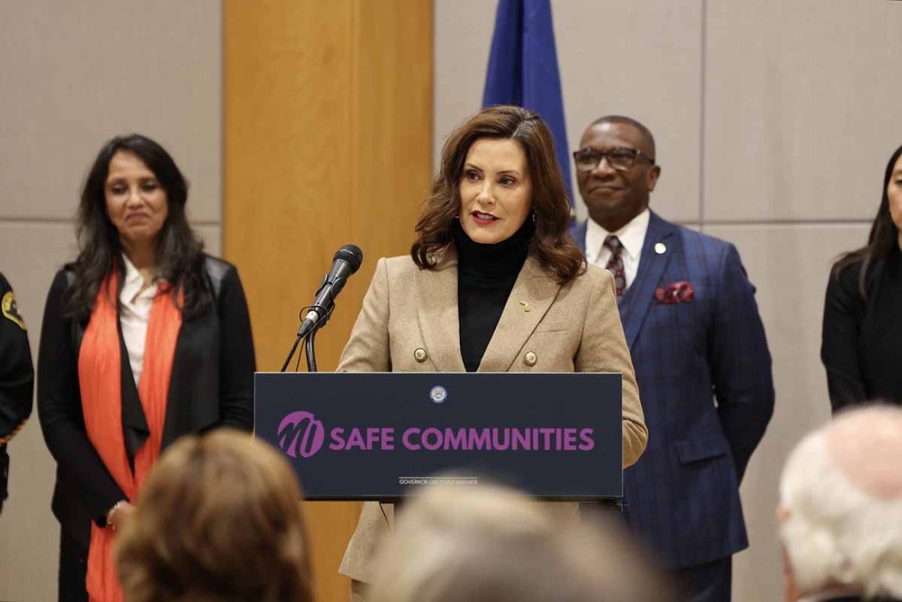 Michigan Gov. Gretchen Whitmer speaking into microphone