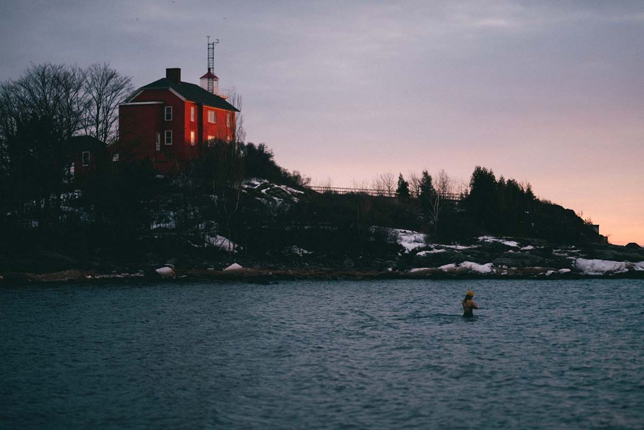 swimmer takes a midwinter dip in Lake Superior