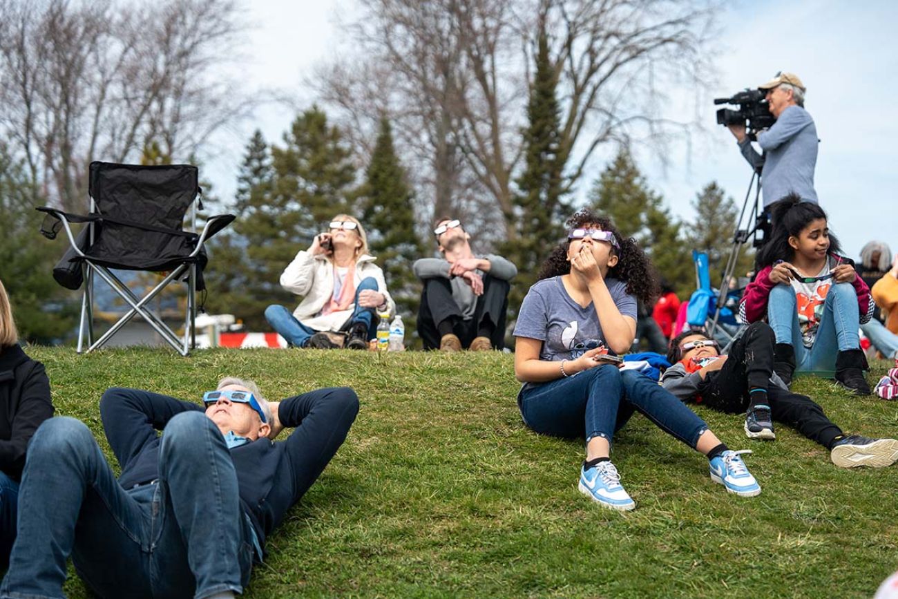 people looking at the sky