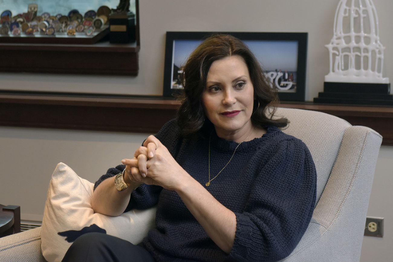 Whitmer sits