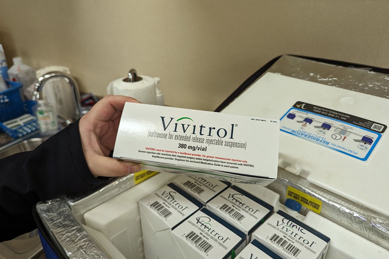 someone holding a box of Vivitrol