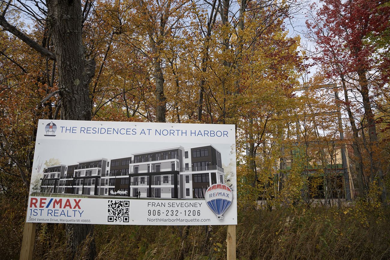 A Re/Max sign for The Residences at North Harbor, being built north of downtown Marquette, Michigan