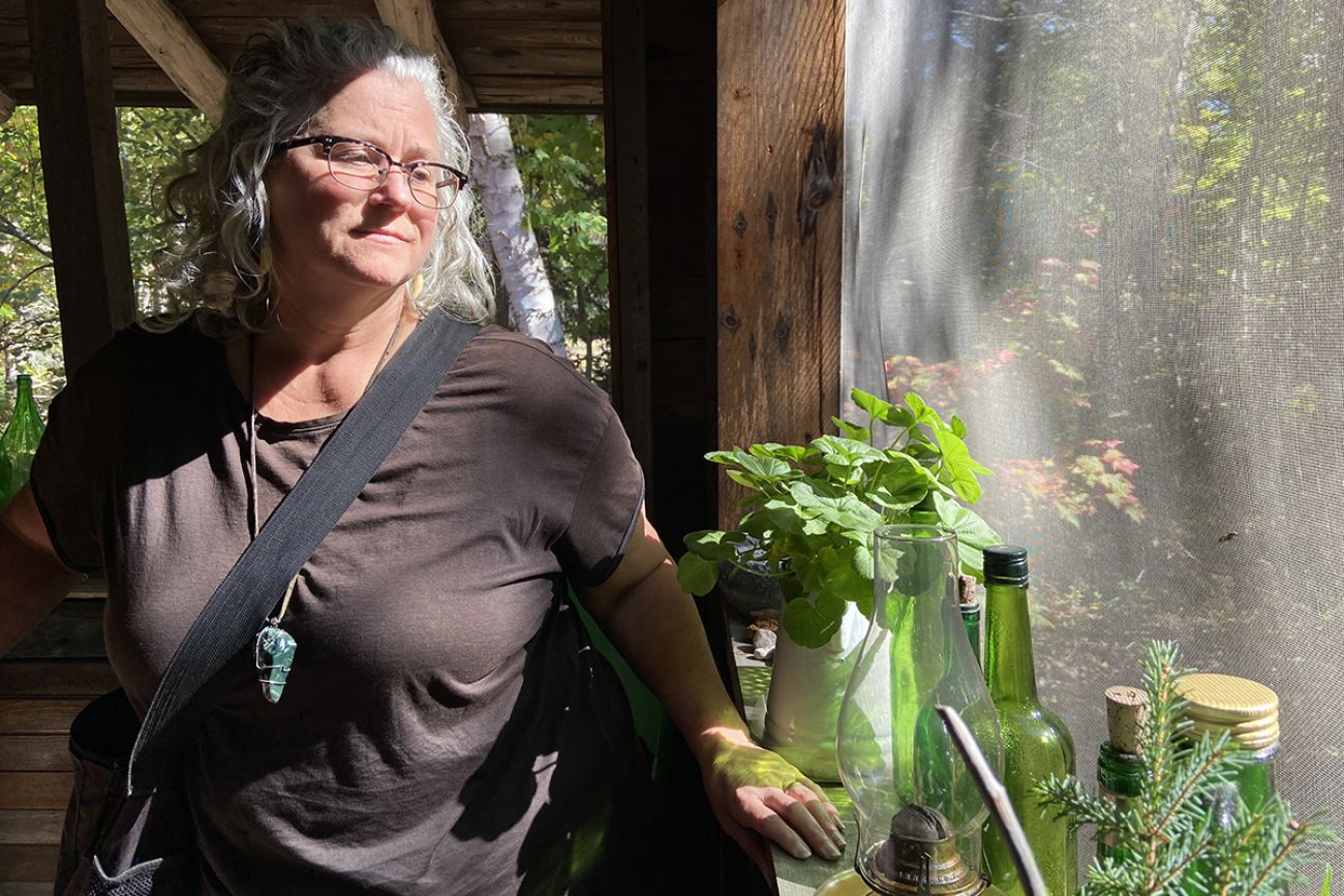 Kathleen Heideman standing next to a window