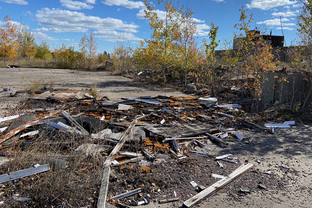 Debris litters the ground at the former Groveland Mine site, in Michigan