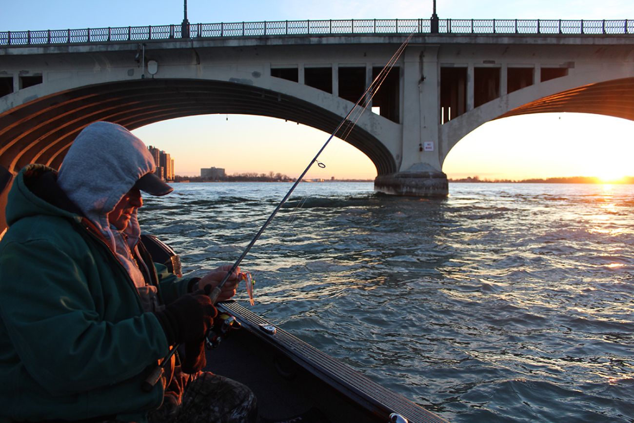 Chesterfield resident Bruce Zurawski fishing on the side of the boat