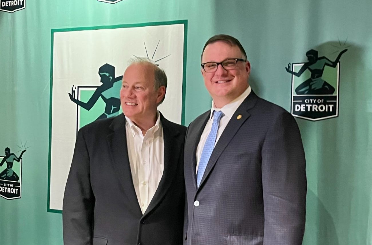 Matt Hall and Mike Duggan stand together