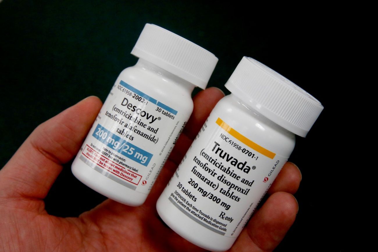 Person holds two HIV prevention drugs