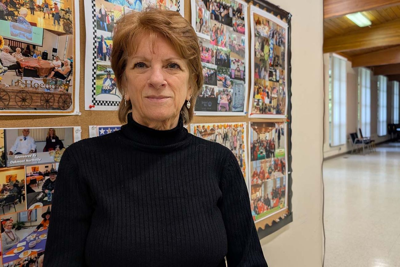 Bobbie Pummill, director of the Plymouth Community Council on Aging, poses for a picture in a hallway.