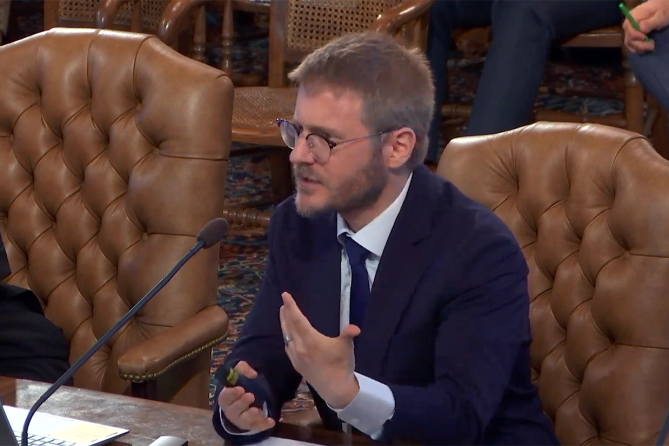 Gabriel Ehrlich sitting at a table.