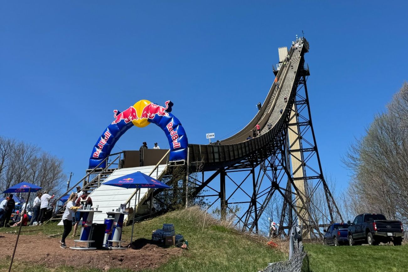 People climb up and down a retired ski jump in Michigan's Upper Peninsula