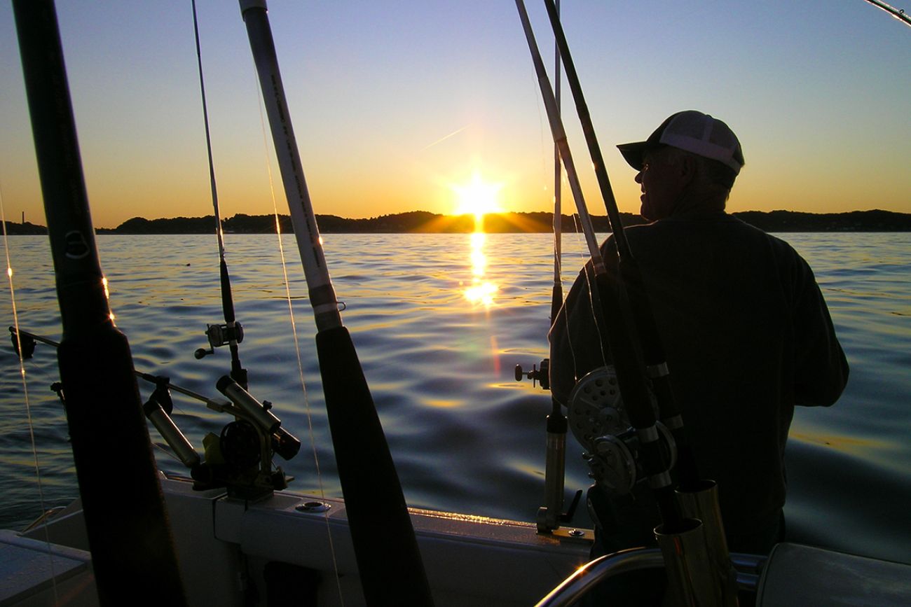 A man fishing on Lake Michigan.