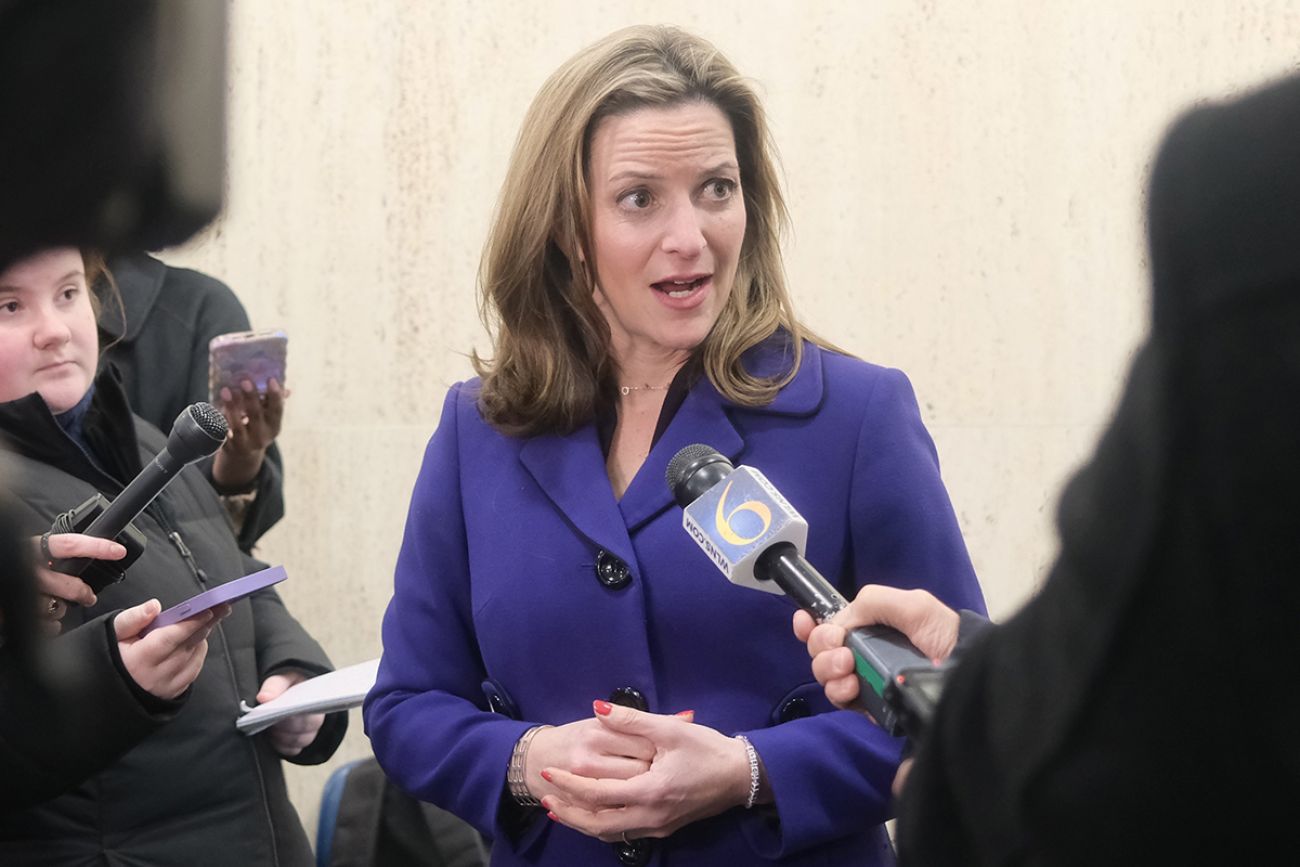 Michigan Secretary of State Jocelyn Benson speaks to reporters.
