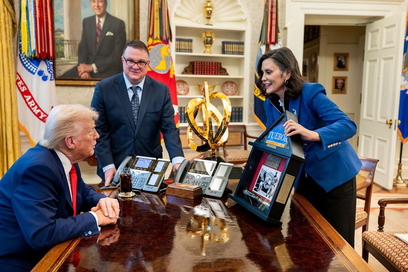 Gov. Gretchen Whitmer, Michigan House Speaker Matt Hall and Donald Trump talk in the Oval Office.